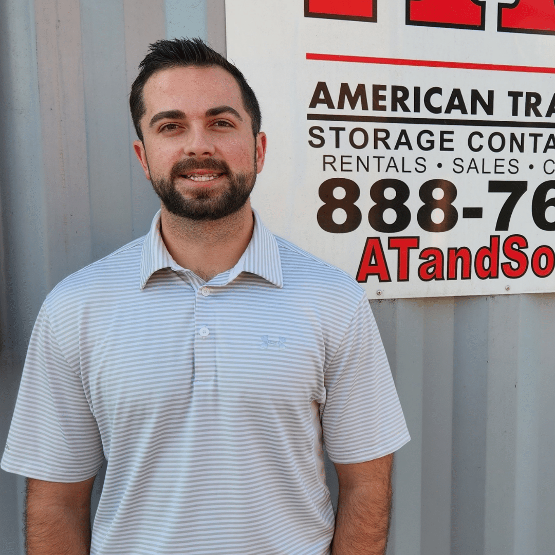 Zach Stanner headshot in front of AT&S container